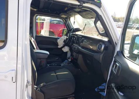 2020 Jeep Wrangler Unlimited from USA, damaged, VIN 1C4HJXEN3LW221347